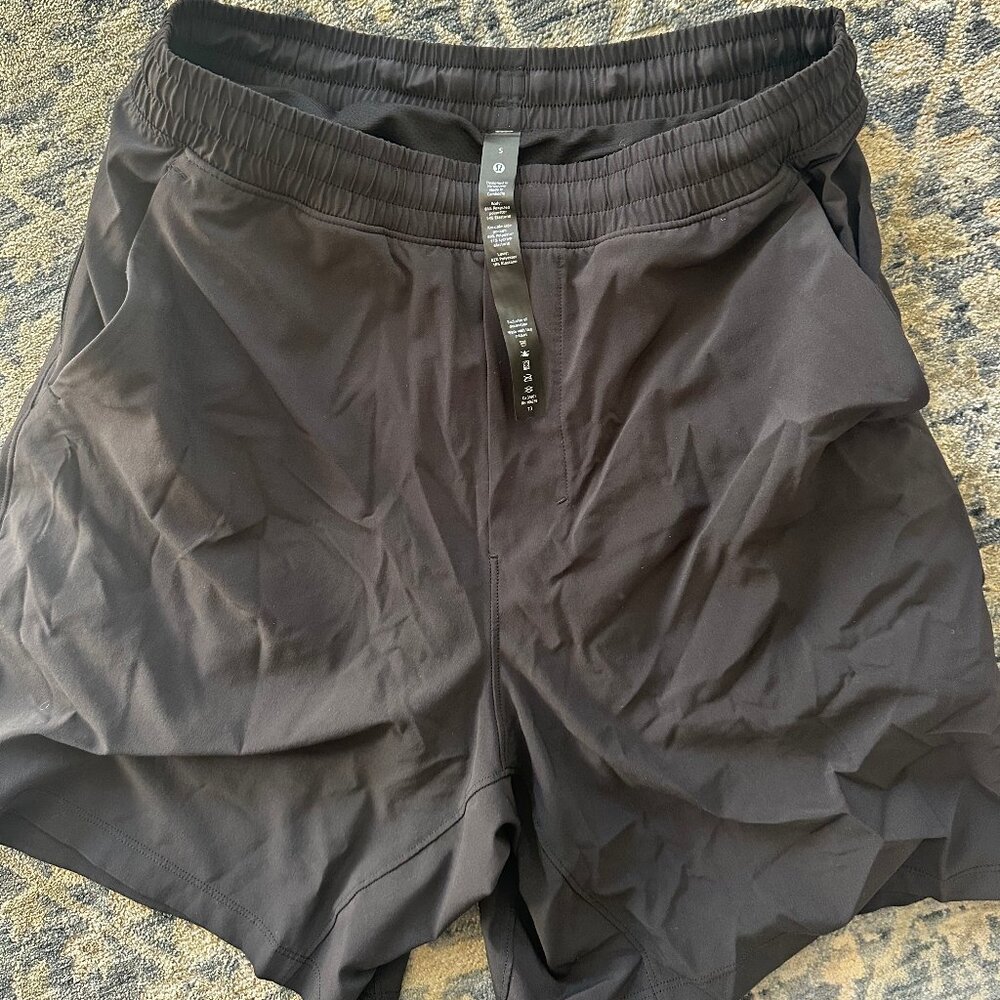 Lululemon Men's Lined Black Shorts (size small)